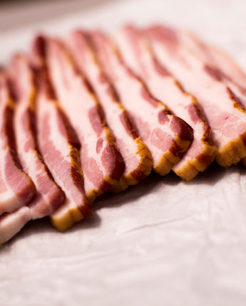 slices of uncooked bacon